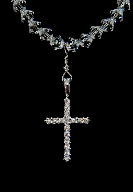 Swarovski crystal beads and cross  $48   on pearls  also $48