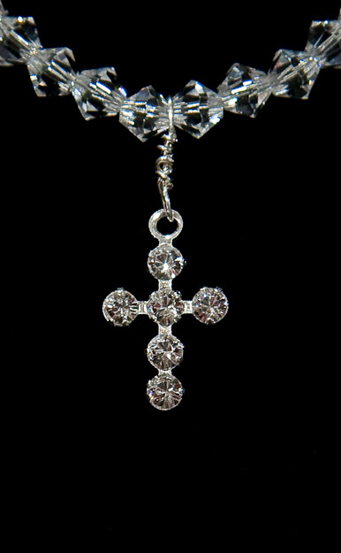 Swarovski crystal beads and tiny cross   $48   on pearls  also  $48