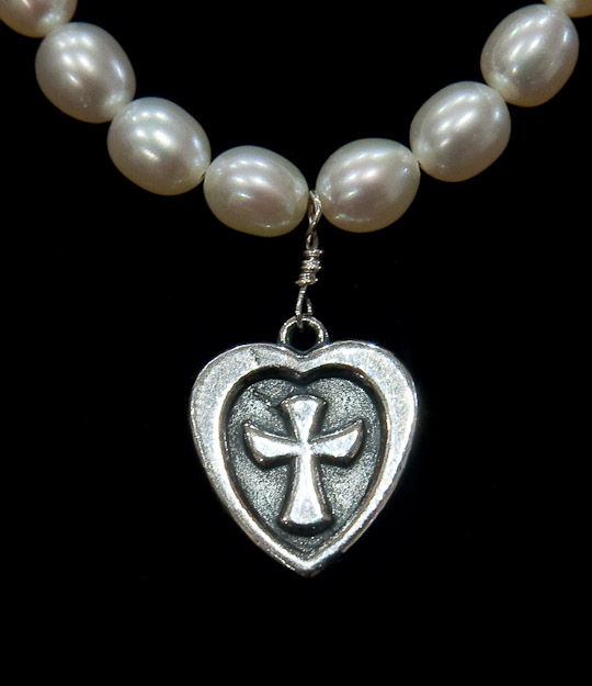 Angel in heart  on pearls $48  on chain  $36